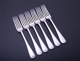 A set of six Victorian feather edge pattern sterling silver table forks