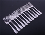 A matched set of twelve George III sterling silver Old English thread table forks
