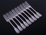 A set of eight George IV fiddle and shell pattern sterling silver table forks