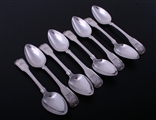 A set of eight George III fiddle, thread and shell sterling silver dessert spoons