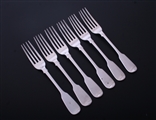 A set of six William IV fiddle pattern sterling silver dessert forks