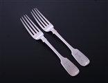 A pair of Irish Victorian fiddle pattern sterling silver table forks