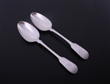 A pair of George IV fiddle pattern sterling silver table spoons