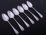 A matched set of six Irish George III Old English pattern sterling silver table spoons