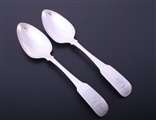 A set of four Irish George III sterling silver fiddle pattern sterling silver table spoons