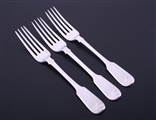 A set of three George IV fiddle pattern sterling silver table forks