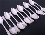A set of 12 William IV King's pattern sterling silver table spoons