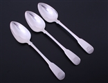 A set of three George III fiddle pattern sterling silver table spoons