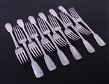 A fine set of twelve Victorian Irish fiddle sterling silver pattern table forks