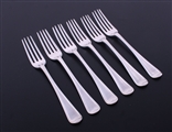 A matched set of six George III Old English Thread pattern sterling silver table forks