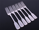 A matched set of six antique fiddle pattern sterling silver table forks
