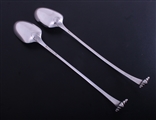 A pair of George III Onslow pattern sterling silver basting spoons