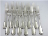 A set of twelve Antique George III fiddle and thread silver table forks