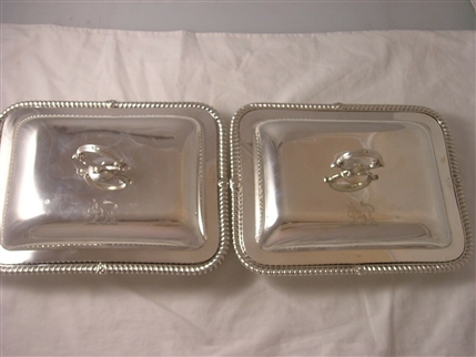 A pair of George III silver entree dishes