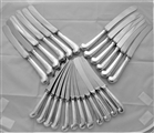 Good crested set of 12+12 pistol handled George II silver dinner & dessert knives C1740