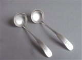 A FINE PAIR OF GEORGE III TODDY LADLES MADE BY WILLIAM MILL OF MONTROSE AND ASSAYED IN EDINBURGH IN 1817.