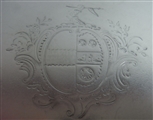 AN EARLY GEORGE III SALVER MADE IN LONDON IN 1761 BY EBENEZER COKER.