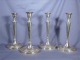 Set of four George III silver candlesticks