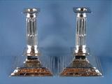 Pair of Charles II silver Chinoiserie candlesticks