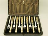 A Fine Antique Victorian English Sterling Silver and Carved Ivory Handled Fish Service For Six Persons