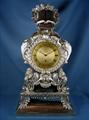 William IV clock by B.L. Vulliamy mounted in silver