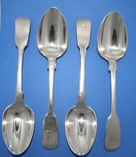 Four Victorian fiddle pattern sterling silver dessert spoons
