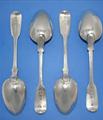 Four Victorian fiddle pattern sterling silver dessert spoons