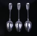 Three William IV fiddle pattern sterling silver dessert spoons