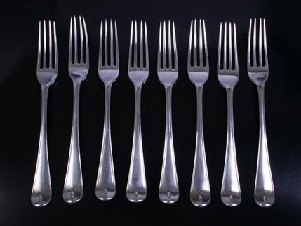 Eight Georgian silver table forks