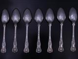 Seven Victorian silver dessert spoons