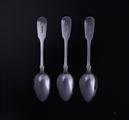 Three William IV fiddle pattern sterling silver dessert spoons