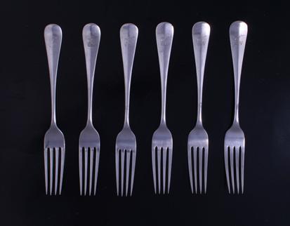 A set of six George V Hanoverian pattern sterling silver table forks