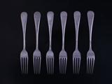 A set of six George V Hanoverian pattern sterling silver table forks