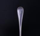 An Edwardian Old English bead edge pattern sterling silver table fork