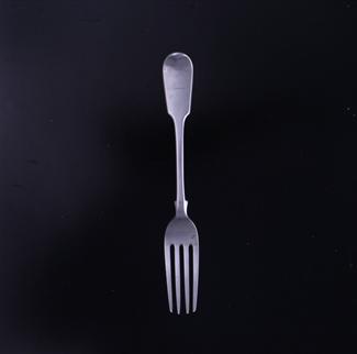 A Victorian fiddle pattern sterling silver desert fork