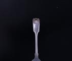 MILITARY: A Victorian fiddle, thread and shell pattern silver teaspoon