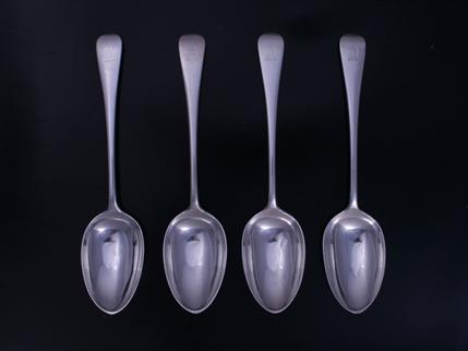 Four Victorian Old English pattern sterling silver table spoons