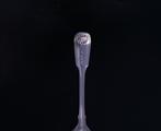 A George V fiddle, thread and shell pattern sterling silver teaspoon