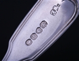 A William IV fiddle and thread pattern sterling silver dessert spoon