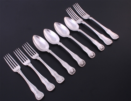 A collection of King's hourglass pattern sterling silver table forks