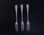 Three George V Hanoverian pattern sterling silver dessert forks