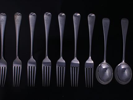 Eight silver table forks