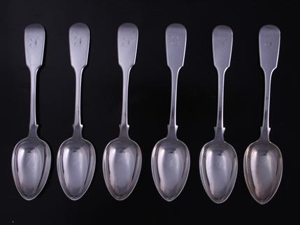 A set of six Victorian fiddle pattern sterling silver dessert spoons
