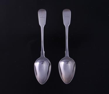 Two George IV fiddle pattern sterling silver dessert spoons