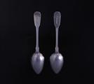 Two George IV fiddle pattern sterling silver dessert spoons