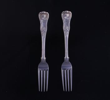 Two George IV silver table forks