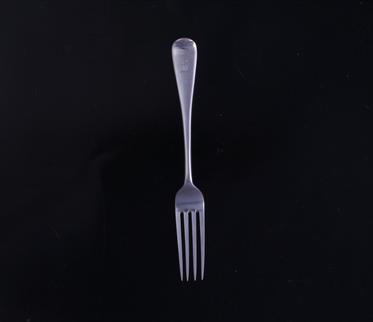 A silver dessert fork
