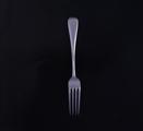 A silver dessert fork