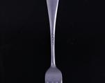 A silver dessert fork