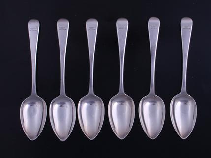 A set of six George III  Old English pattern sterling silver dessert spoons